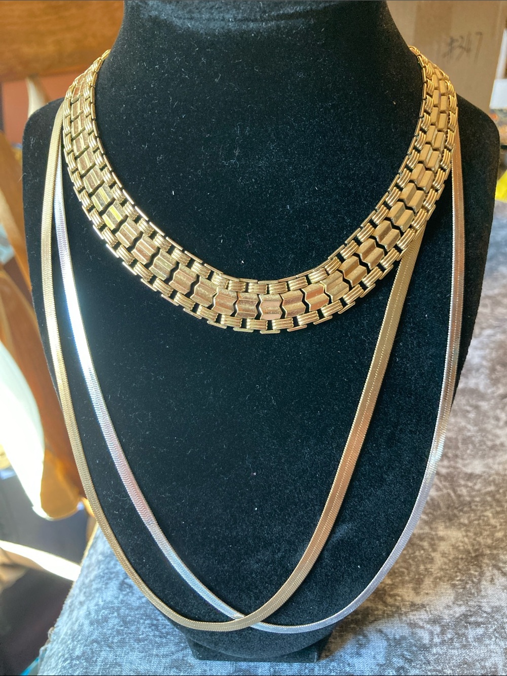 Three-piece, gold tone and Silvertown necklace bundle